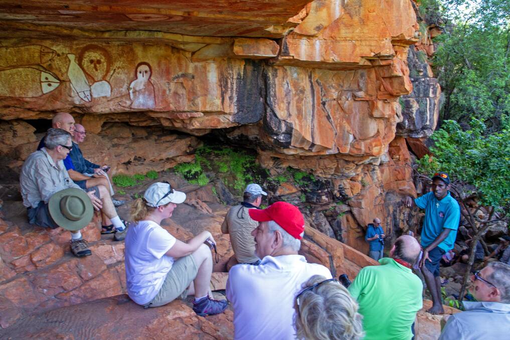 Cruise passengers at a Wandjina art site.