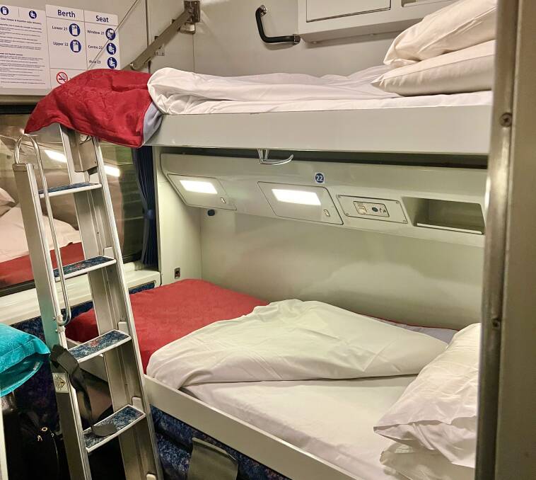 The bunk beds at night.