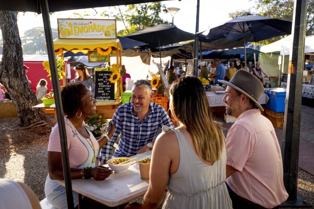 Locals enjoying laksa at the markets. Picture: Tourism NT/Matt Cherubino Locals enjoying laksa at the markets. Picture: Tourism NT/Matt Cherubino