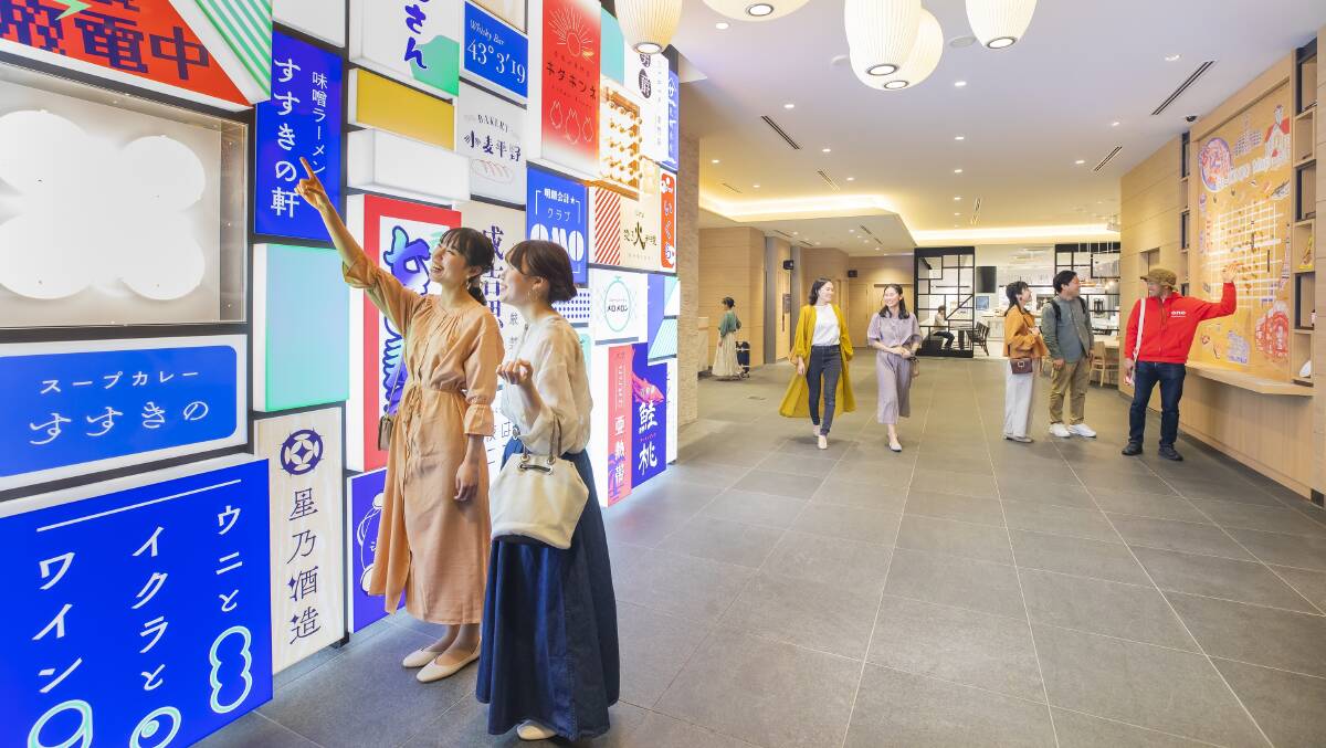 The lobby is a wall of neon signs inspired by Susukino's nightlife. The lobby is a wall of neon signs inspired by Susukino's nightlife.
