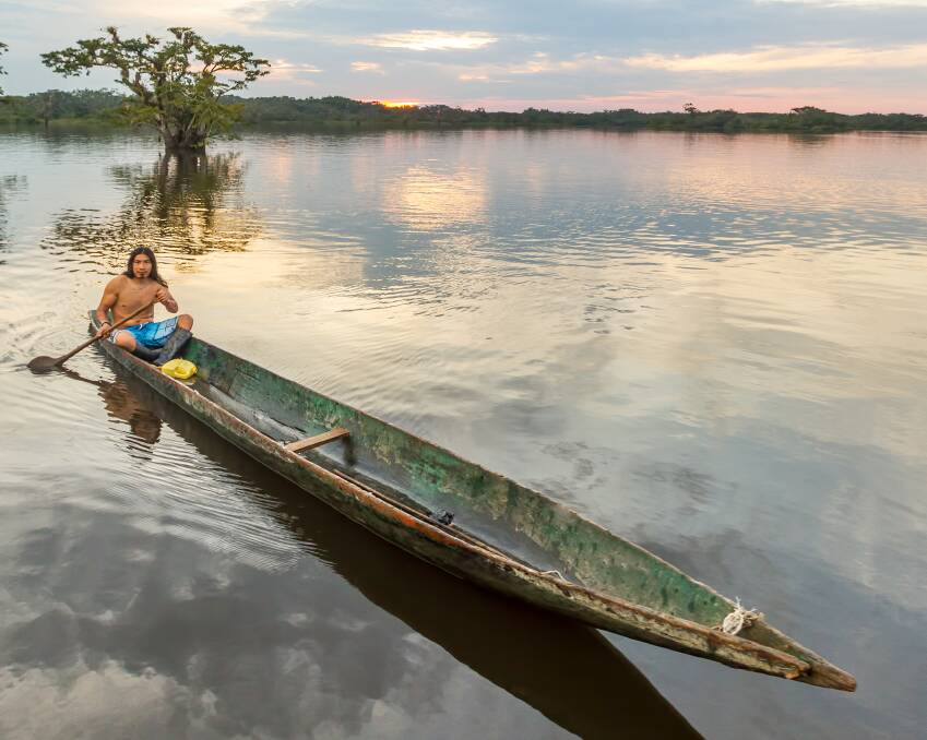 Authentic experiences can lie in the everyday rhythm of life, like a canoe in the Amazon. Picture by Shutterstock
