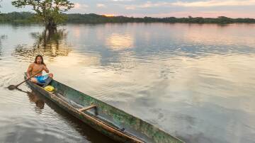 Authentic experiences can lie in the everyday rhythm of life, like a canoe in the Amazon. Picture by Shutterstock
