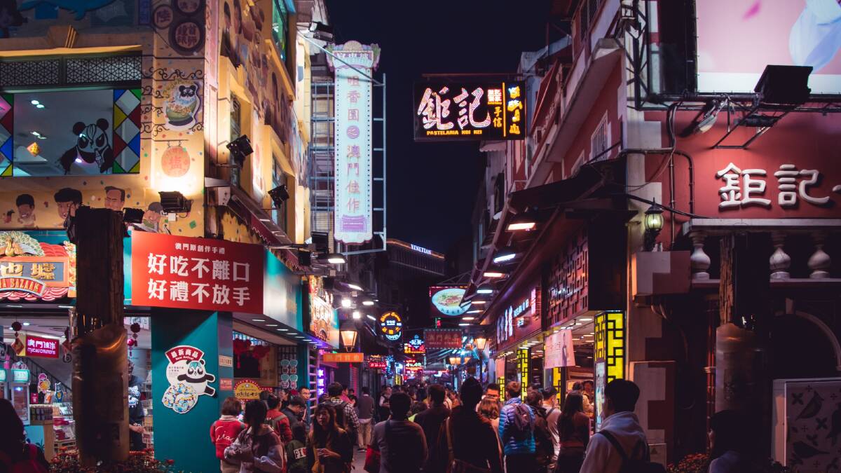 A bustling eat street in Macau. Picture: Unsplash A bustling eat street in Macau. Picture: Unsplash