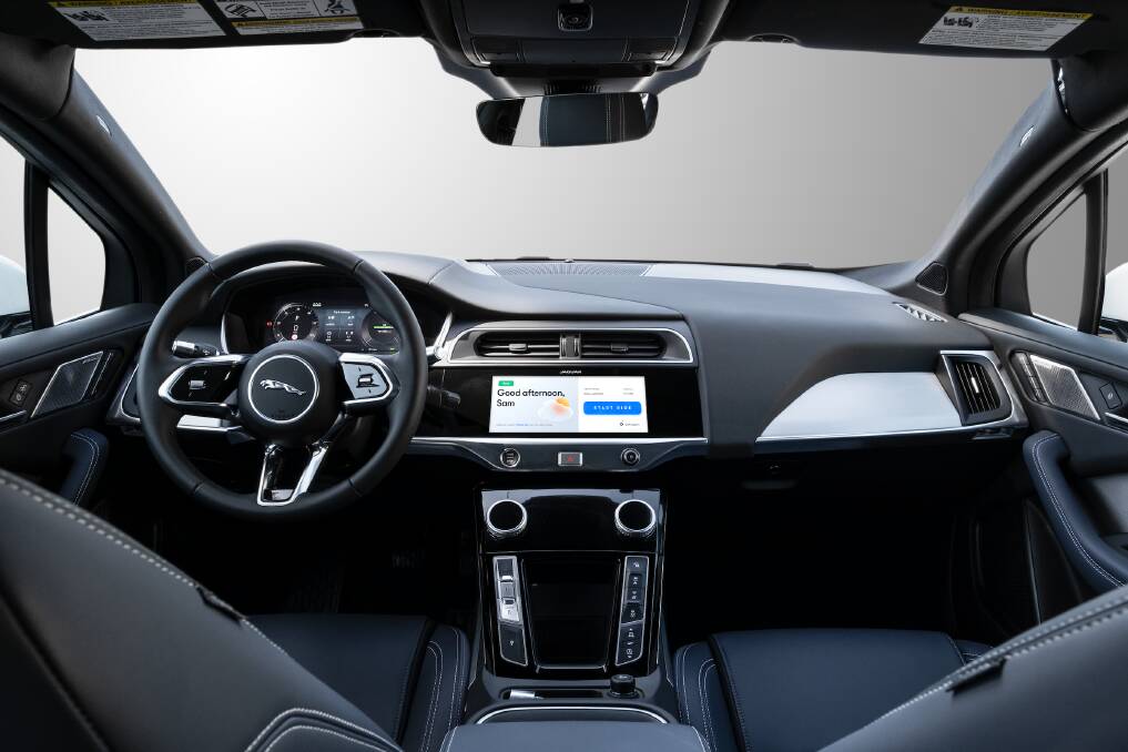 The slick interiors of the Waymo taxi.