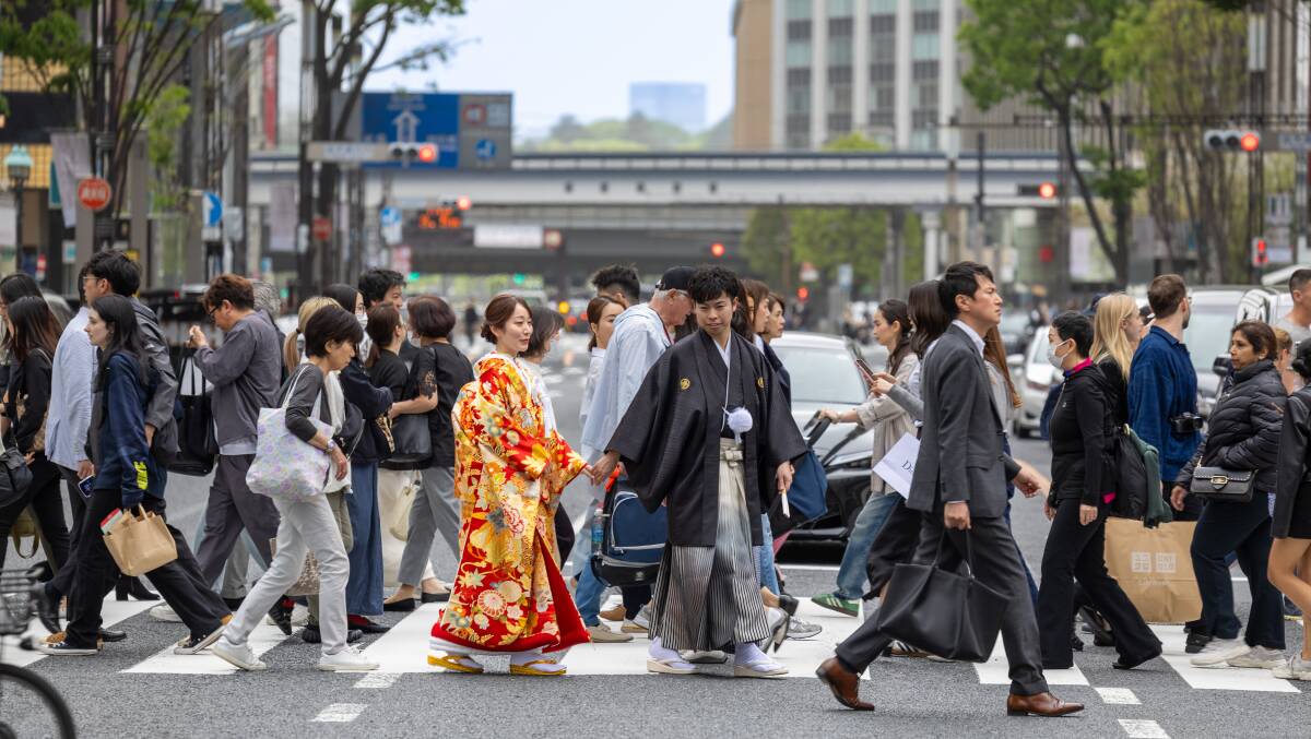 A busy street in Tokyo. A busy street in Tokyo.