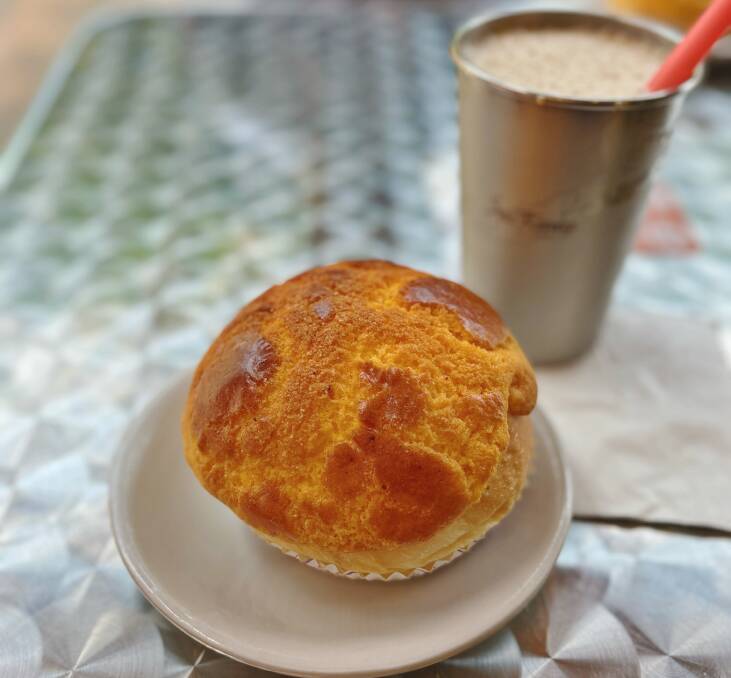 The greatest morning tea of all time: a fluffy pineapple bun. Picture: Carrie Hutchinson
