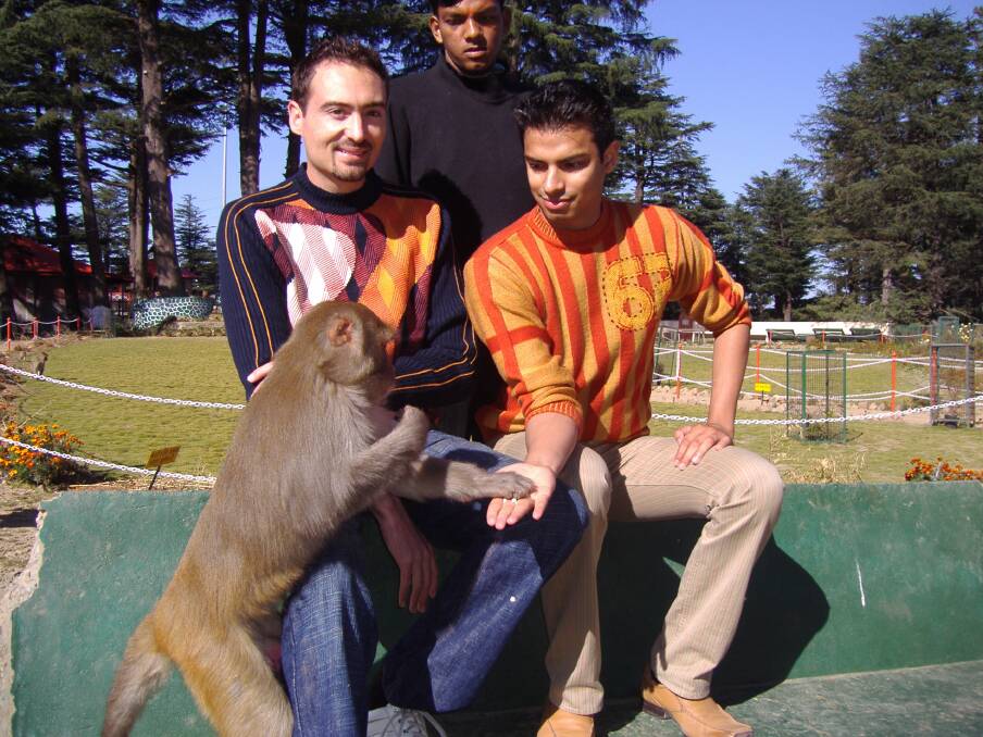 The writer (right) feeding a monkey with his partner (left) at Monkey Temple in 2006. The writer (right) feeding a monkey with his partner (left) at Monkey Temple in 2006.