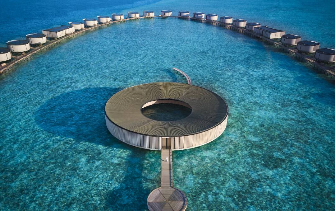 The resort's ring-shaped spa, fringed with overwater villas. The resort's ring-shaped spa, fringed with overwater villas.