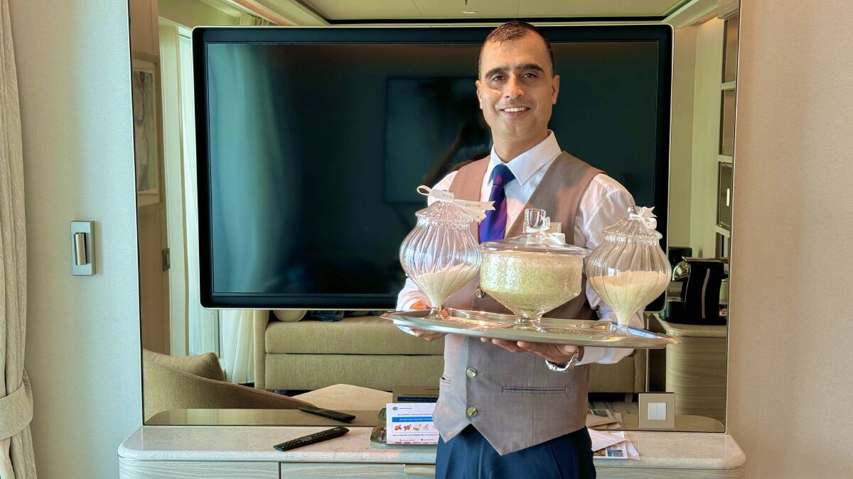 Butler Deependra, presenting the bath salts. Picture: Akash Arora