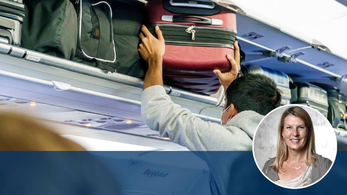 Just one more push for a spot in an overhead bin. Picture by Getty Images
