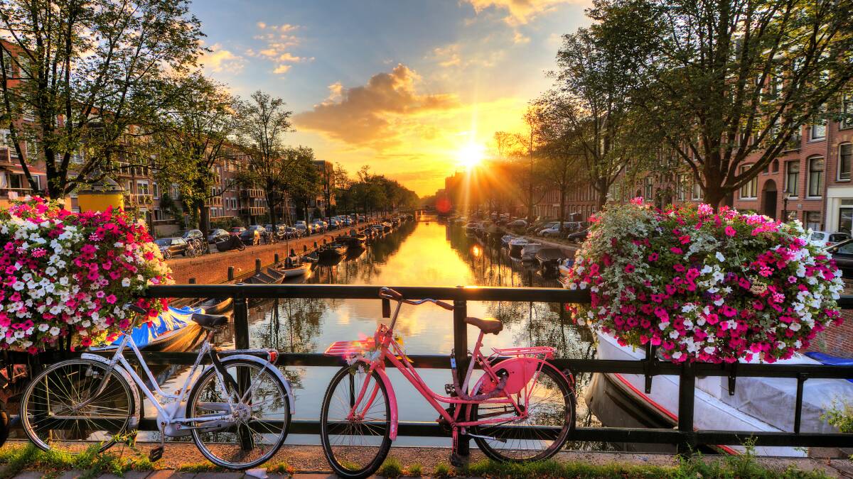 A scenic canal in Amsterdam. A scenic canal in Amsterdam.