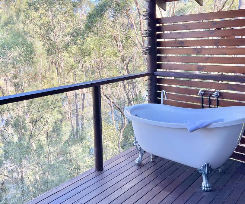 On the balcony of a Deluxe Cabin.