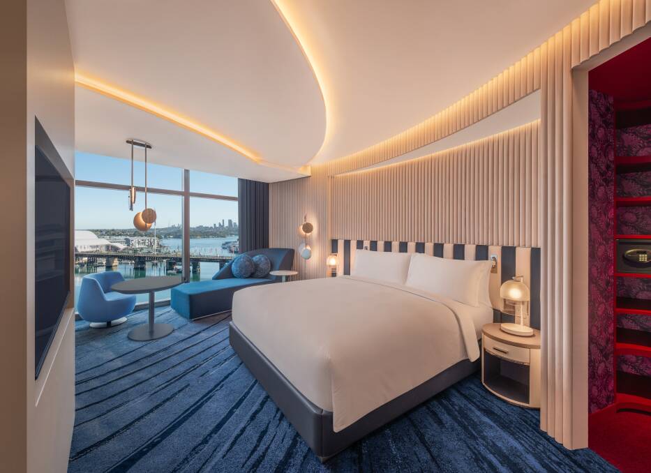 A guestroom with Darling Harbour views. A guestroom with Darling Harbour views.