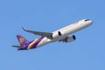 I flew business class to Bangkok for the price of premium economy - here's how