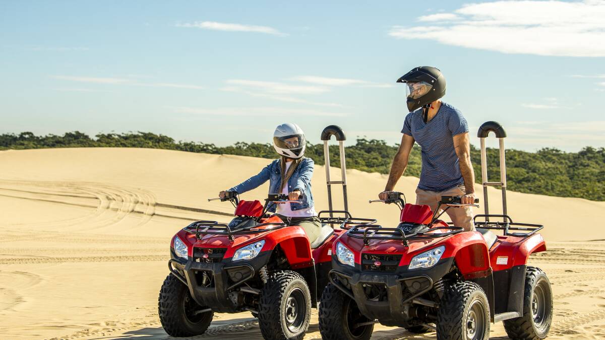 A quad bike adventure in Port Stephens. Picture: Destination NSW A quad bike adventure in Port Stephens. Picture: Destination NSW