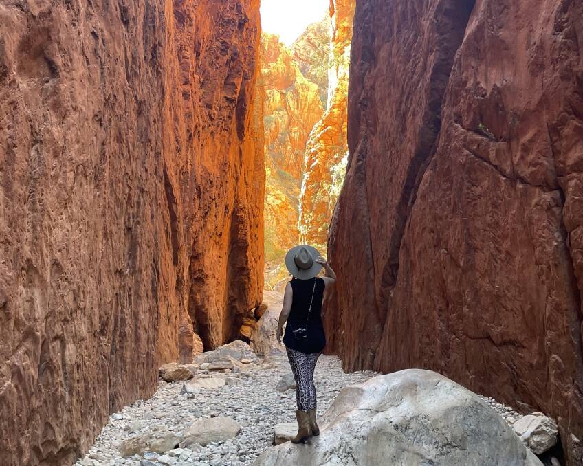 Afternoon sunshine creates a golden glow at Standley Chasm. Picture: Katie Spurgo