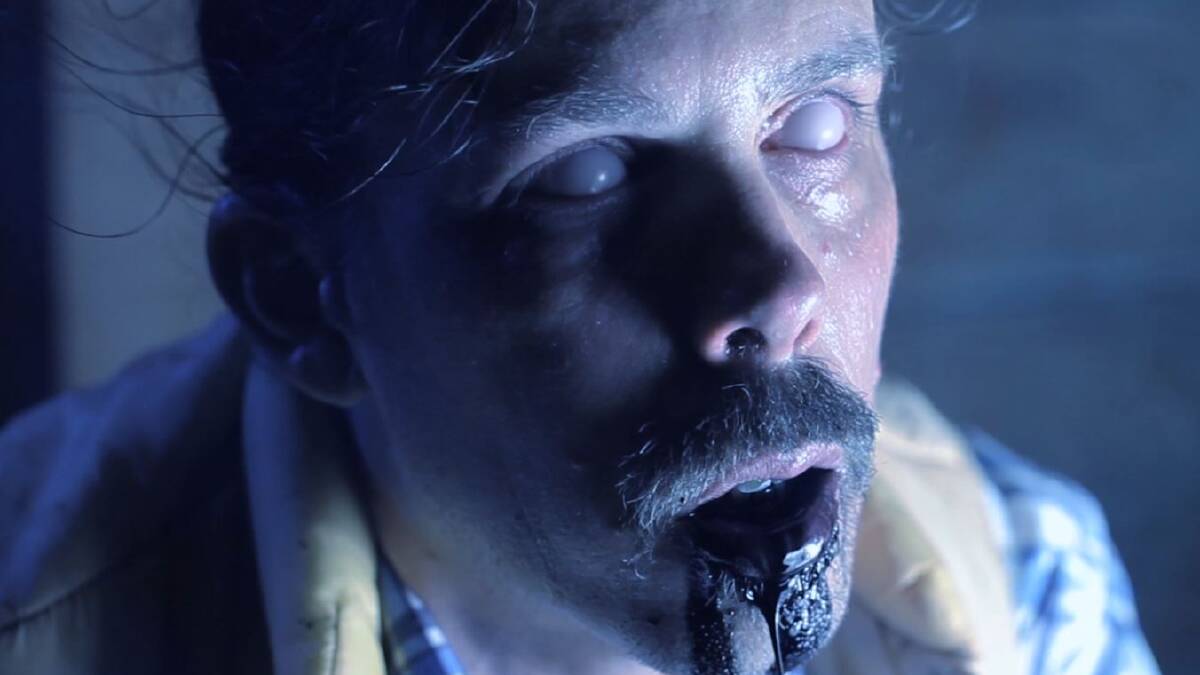 An actor in realistic horror makeup, waiting to scare visitors to Baton Rouge's 13th Gate. An actor in realistic horror makeup, waiting to scare visitors to Baton Rouge's 13th Gate.