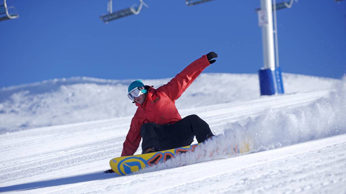 Snowboarder on thick snow at Mt Buller. ACM file picture
