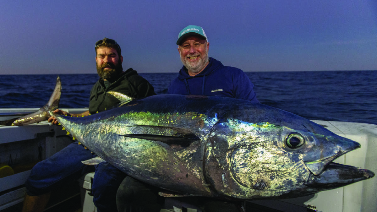 Big smiles after reeling in a tuna. Picture supplied