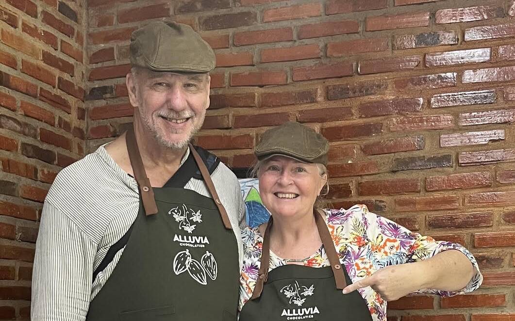 Ken and Mary-Lou in a chocolate factory on the Mekong Delta, Vietnam while she was writing her novel, The Chocolate Factory. Picture supplied