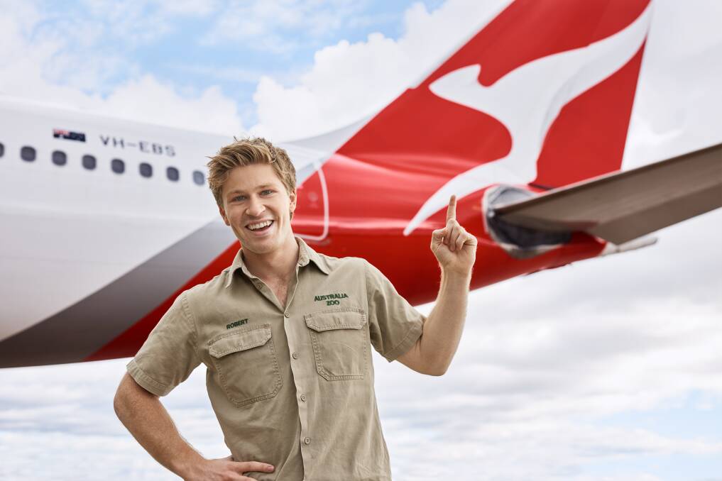 Australian conservationist Robert Irwin pictured in front of a Qantas plane. Picture supplied