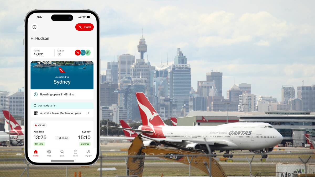The view from a Sydney Airport runway in Mascot to the CBD (main image) and the Qantas app displaying digital pass. Picture Tamara Dean The view from a Sydney Airport runway in Mascot to the CBD (main image) and the Qantas app displaying digital pass. Picture Tamara Dean
