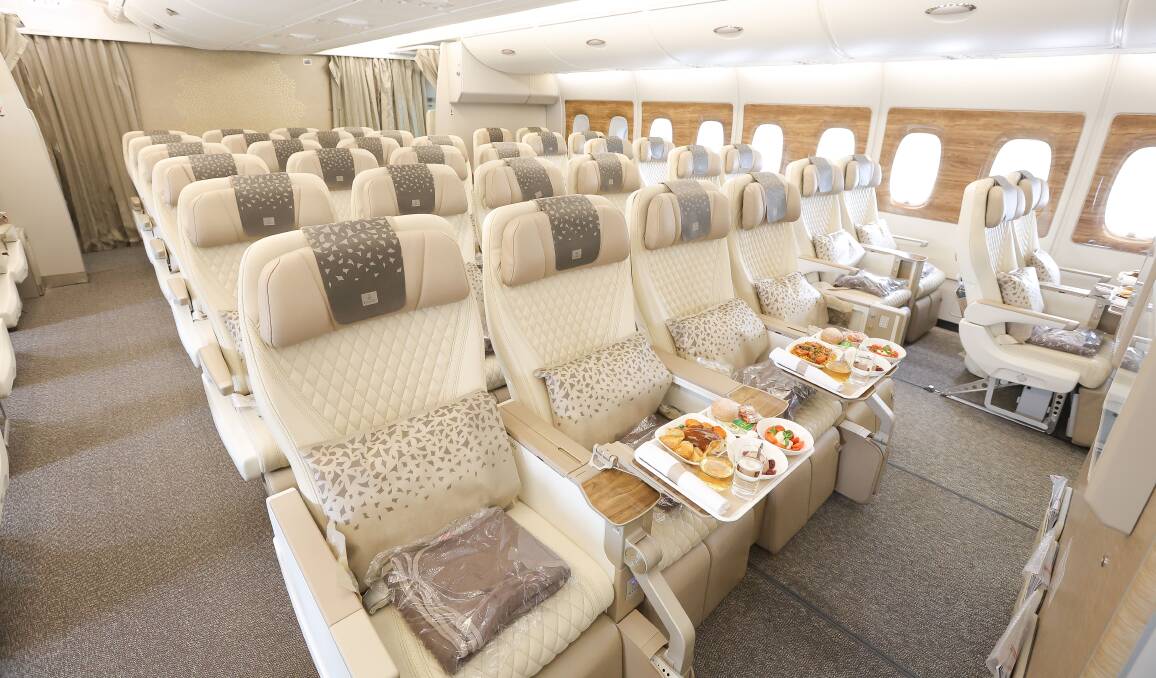 Emirates premium economy provides passengers with cream leather seats in two-four-two configuration. Emirates premium economy provides passengers with cream leather seats in two-four-two configuration.