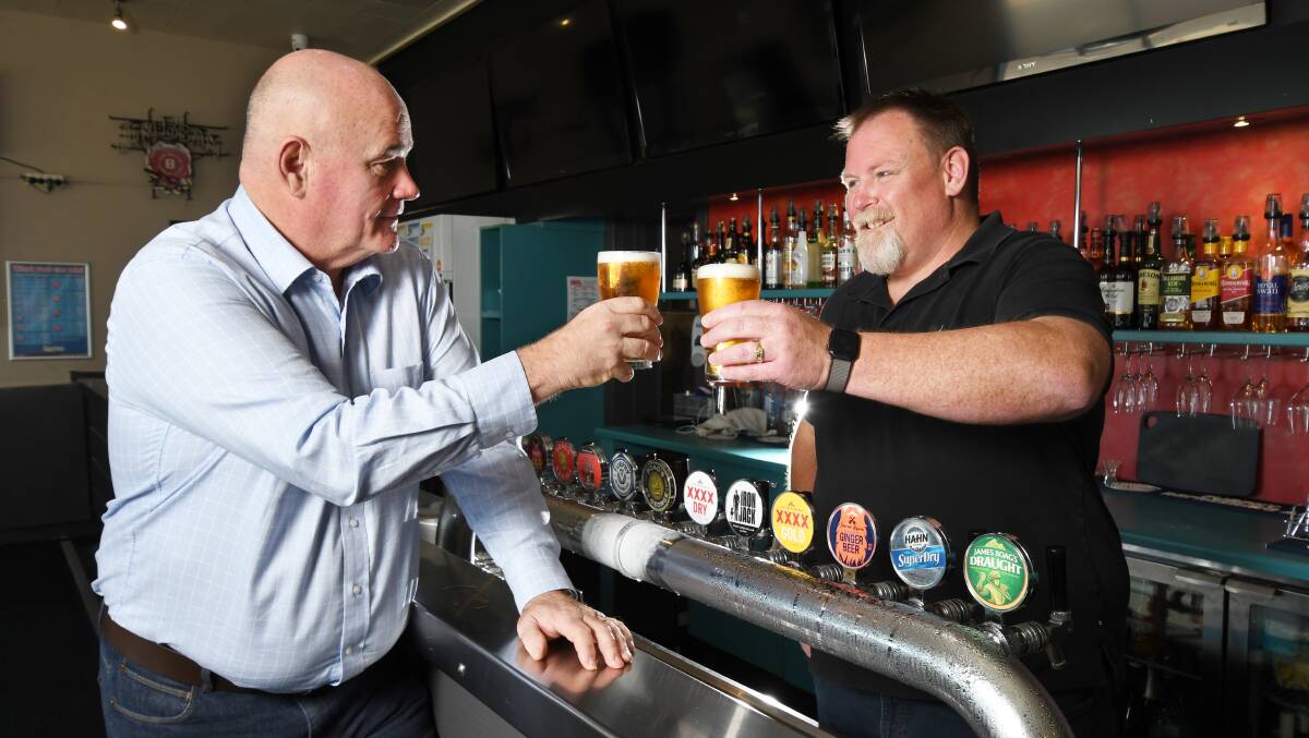 National CEO of Australian Hotels Association Stephen Ferguson and Beach Hotel Burnie owner Ben Carpenter share a beer in 2022. Picture file. National CEO of Australian Hotels Association Stephen Ferguson and Beach Hotel Burnie owner Ben Carpenter share a beer in 2022. Picture file.