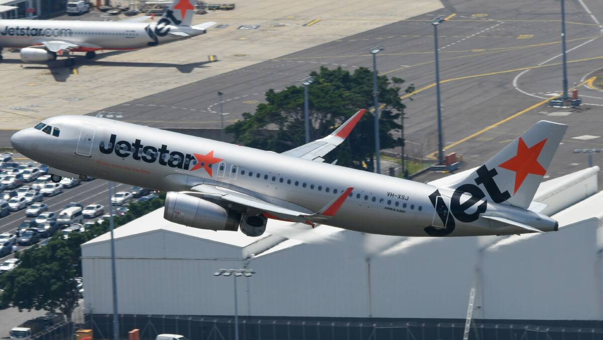 A Jetstar plane in the air. Picture from Unsplash/Haydn A Jetstar plane in the air. Picture from Unsplash/Haydn