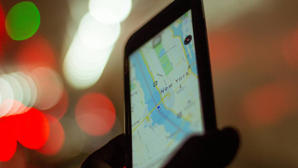A mobile phone with a map of New York. Picture by Unsplash / Enrique Alarcon