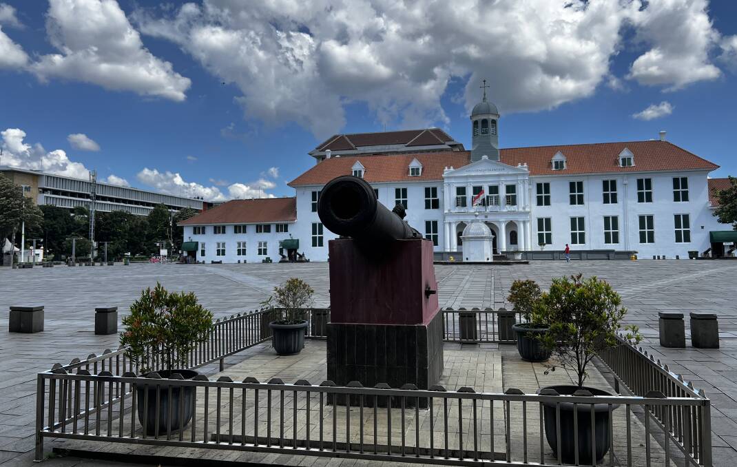 An ancient Portuguese cannon guards the old colonial governor's residency in Jakarta. Picture: John Hanscombe