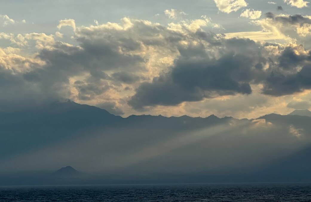 Bali broods under cloud as the Viking Orion steams towards Surabaya. Picture: John Hanscombe