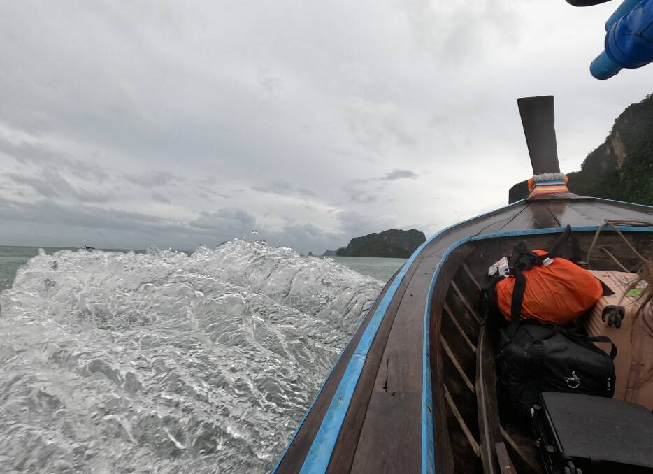 All aboard the longtail boat for the trip to Railay Beach and a few more lines of caption here yes a few more lined. Picture: John Hanscombe