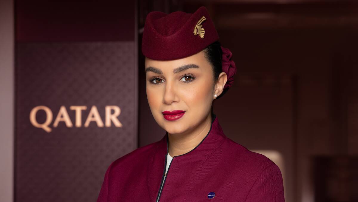 A Qatar Airways cabin crew member.