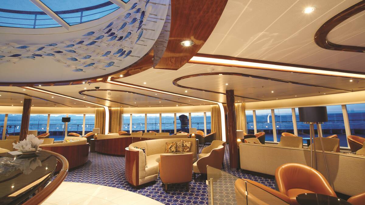 The Observation Bar, the perfect place to enjoy a cocktail while sailing away from port.
