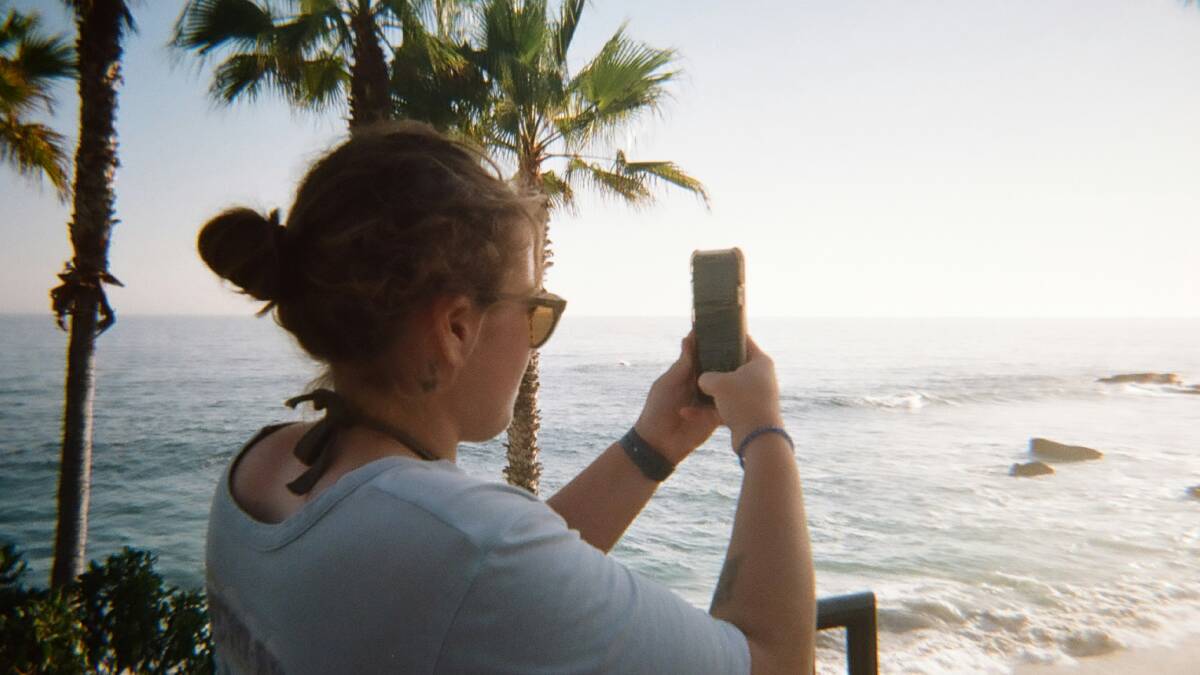 Taking photos on holidays and sharing them with loved ones is actually beneficial for connection. Picture by Maria Lysenko/Unsplash