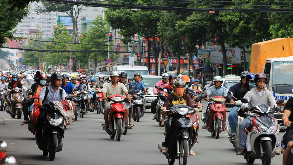Riders in Ho Chi Ming City, Vietnam. Picture by Leonie Clough/Unsplash