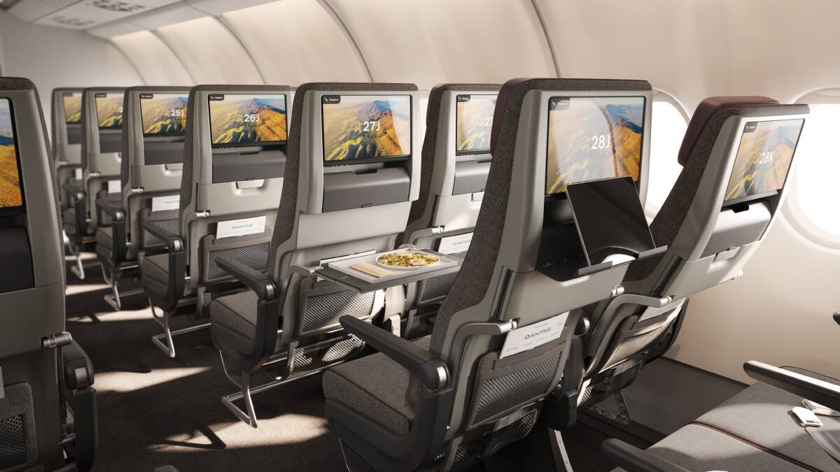 Qantas A330 cabin upgrade showing larger entertainment screens in economy class. 