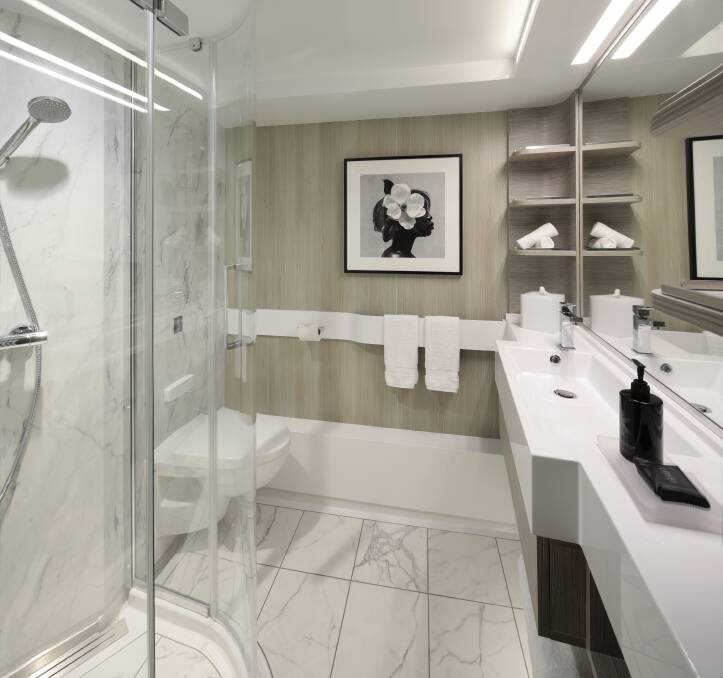 The deluxe bathroom inside Celebrity Cruises cabin 12125.