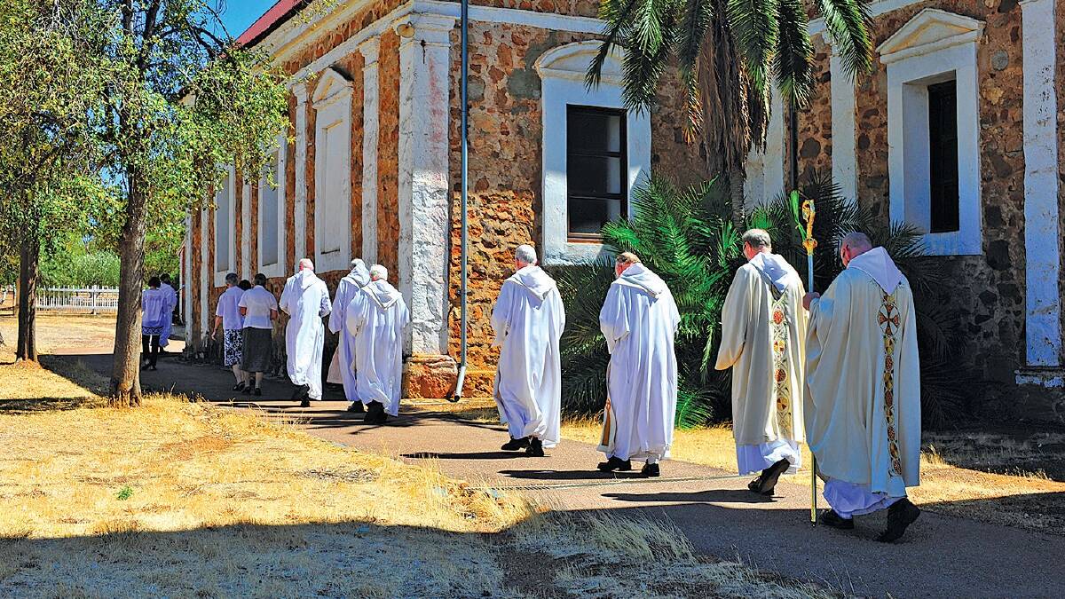Monks on their procession from church. Picture by Destination Perth