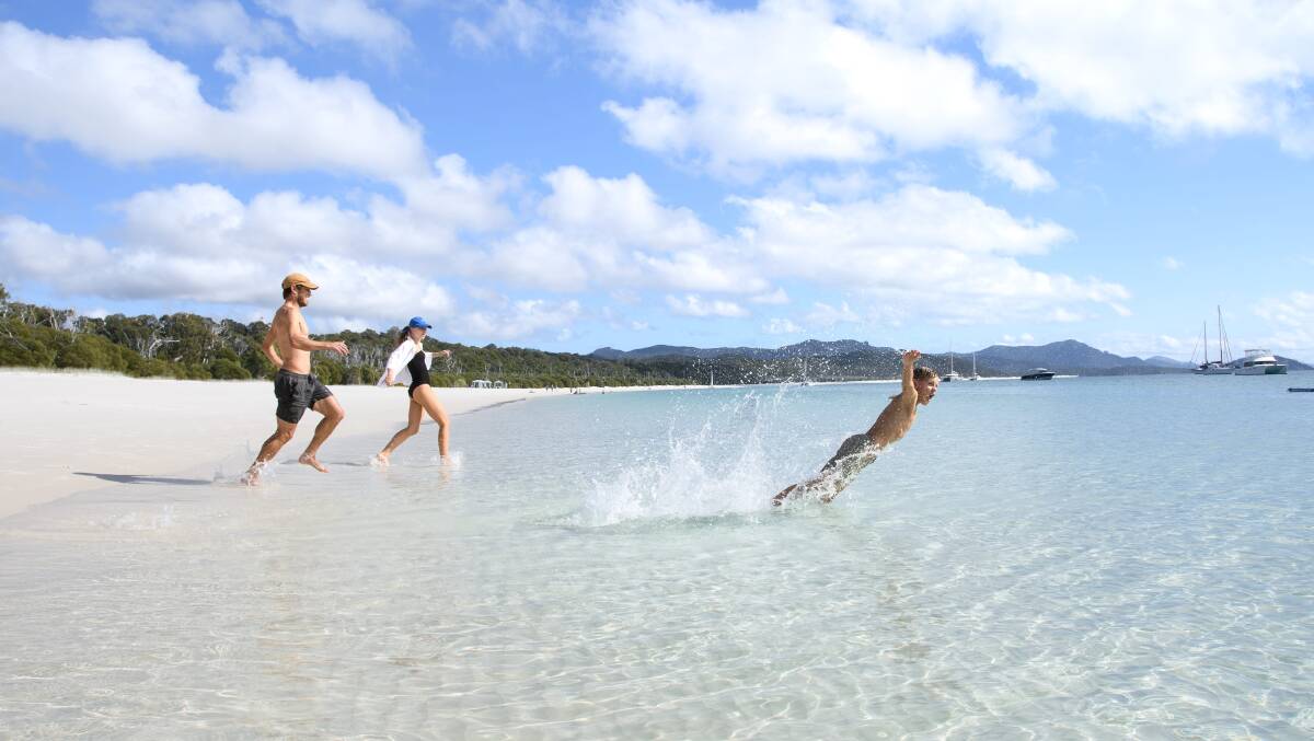 The white sands of Whitehaven Beach, Queensland. Picture by Courtney Atkinson/AWOL Family