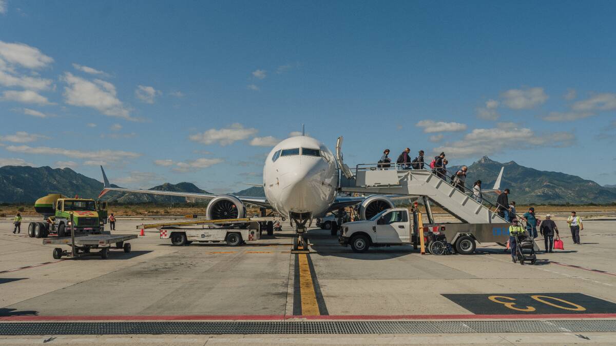 Passengers disembark an aircraft. Picture: Supplied Passengers disembark an aircraft. Picture: Supplied