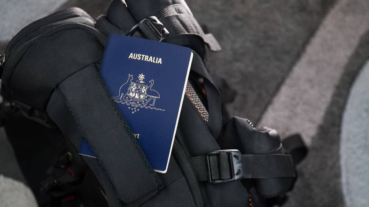 An Australian passport and a backpack. Picture by Shutterstock An Australian passport and a backpack. Picture by Shutterstock