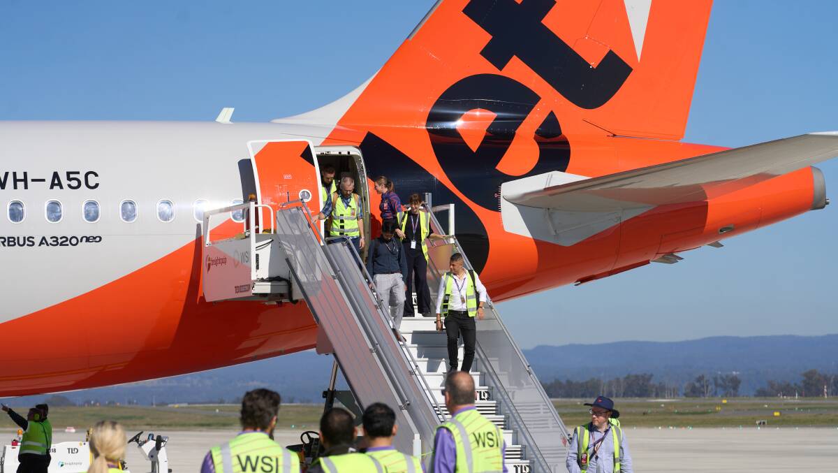 An historic Jetstar test flight touches down at Western Sydney International Airport on September 1. An historic Jetstar test flight touches down at Western Sydney International Airport on September 1.