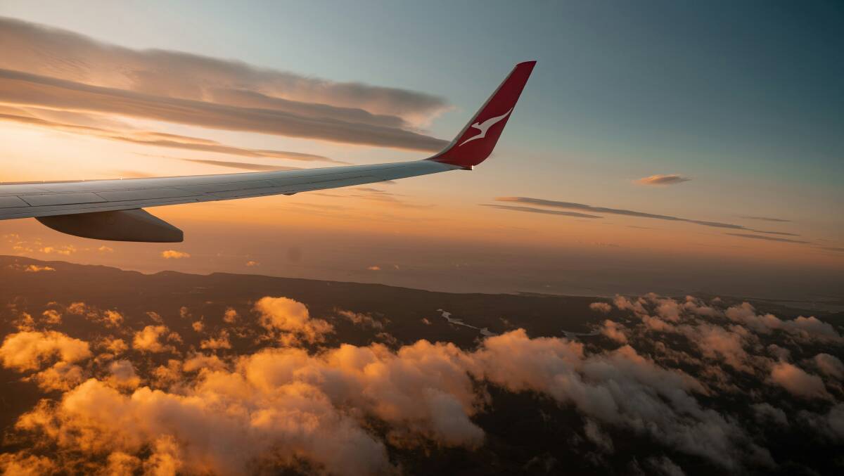 The wing of a Qantas aircraft. Picture by Unsplash/Sam Carter