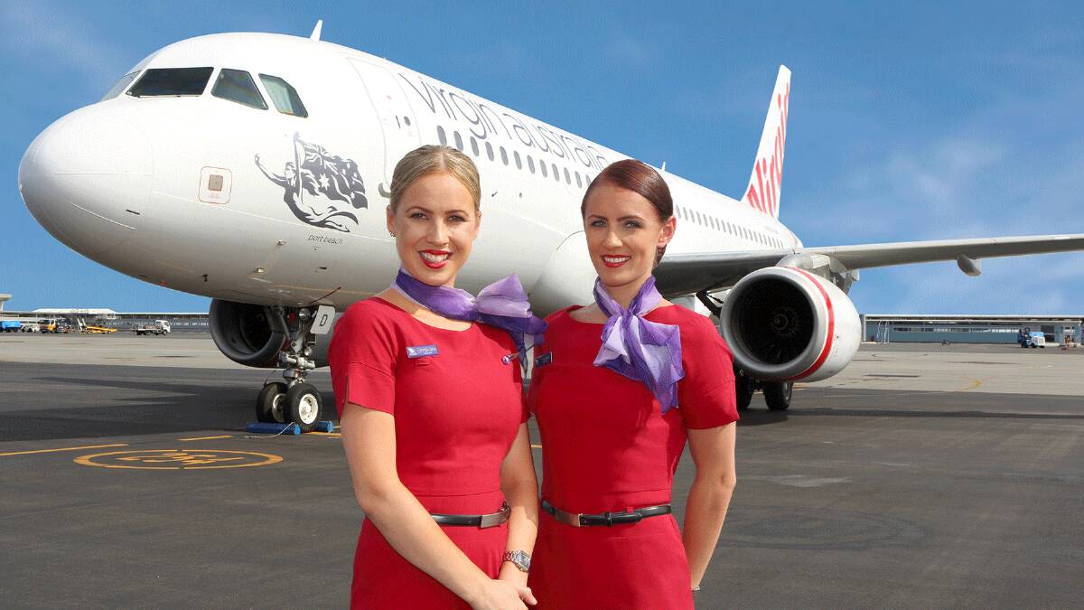 Virgin Australia staff with one of the carrier's Airbuses. 