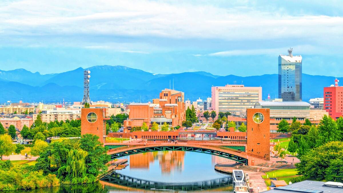 Fugan Canal Kansui Park in Toyama, Japan, with the Tateyama Mountain Range in the distance. Picture by Daniel Beauchamp/Unsplash