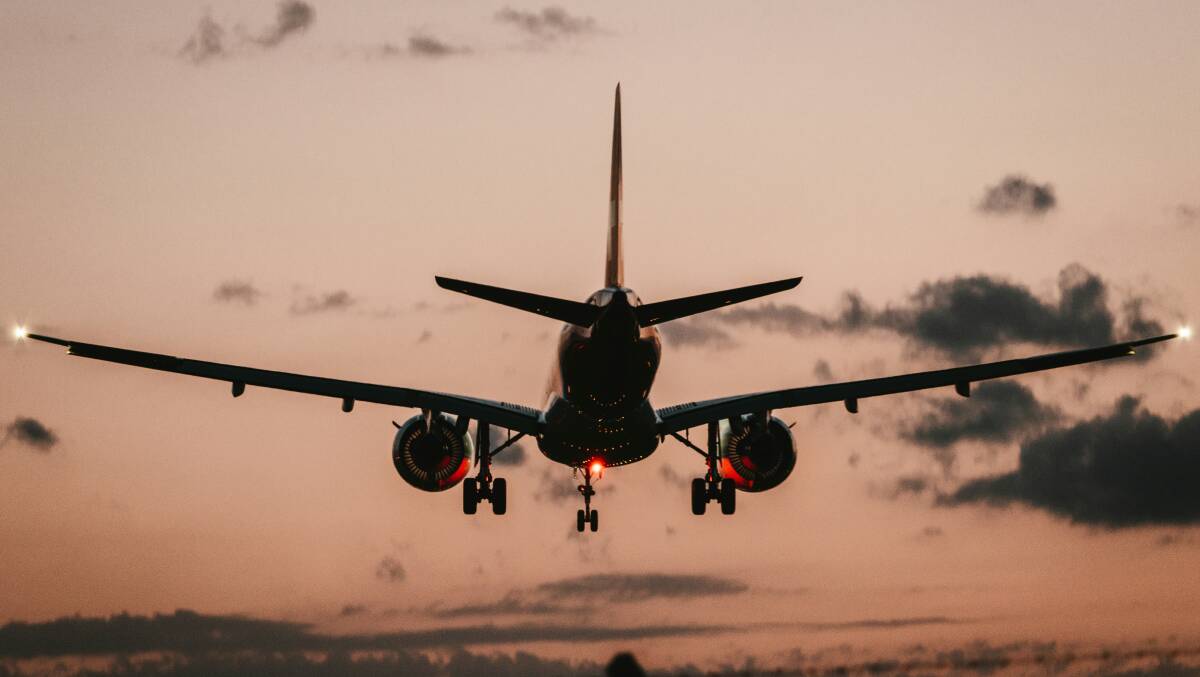 An aircraft landing. Picture by Claudio Schwarz/Unsplash