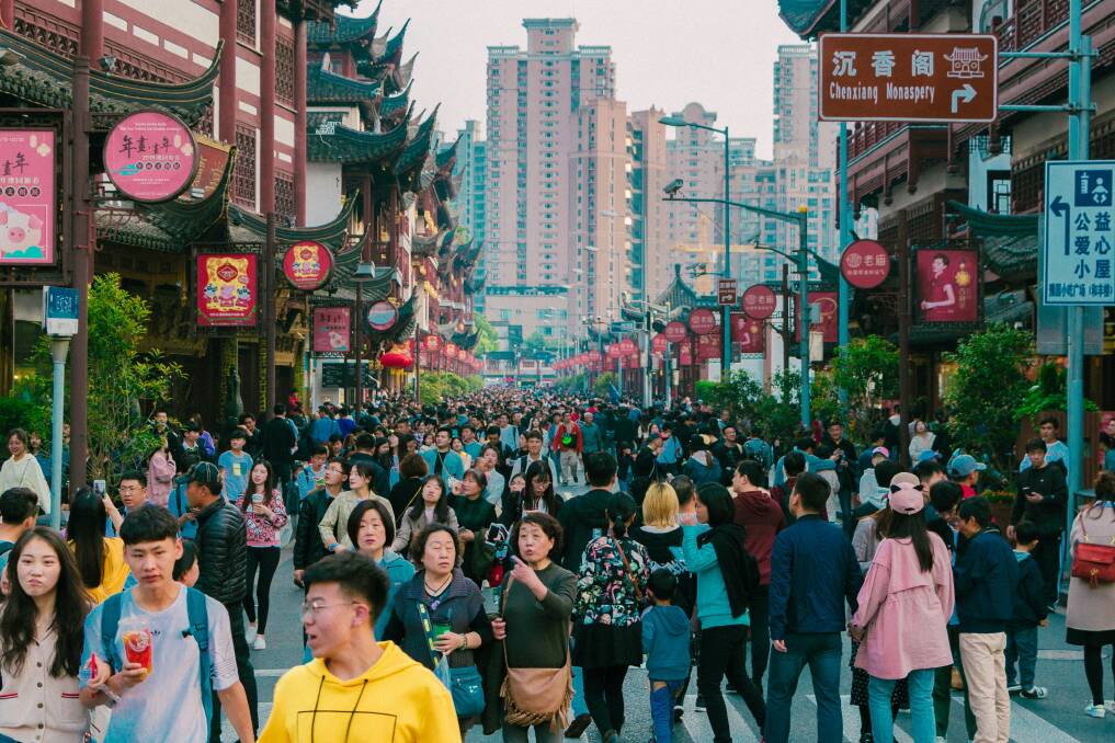 A busy street in Shanghai, China, where the travel advice is currently "exercise a high degree of caution". Picture by Javier Quiroga/Unsplash