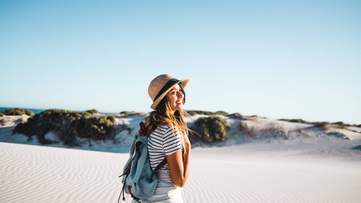 A woman travels solo. Picture by Shutterstock